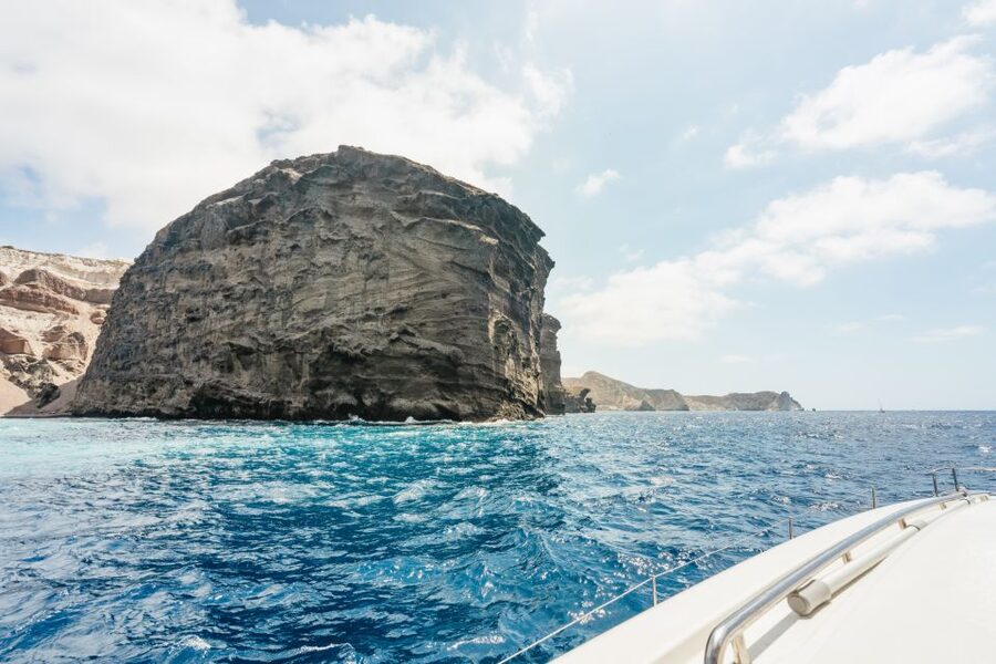 Santorini: Luxury Catamaran Day Trip with Meal and Open Bar - Greek food, local drinks, and a relaxed deck
