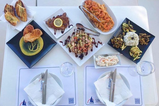 Santorini Luxury Catamaran Sunset Cruise with BBQ, Drink and Transfer - Starting at Ammoudi or Athinios Port
