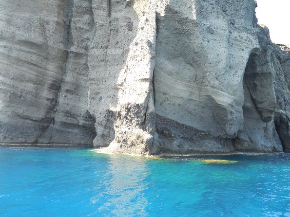 Santorini Luxury Catamaran Sunset Cruise with BBQ, Drink and Transfer - Swimming near the hot springs