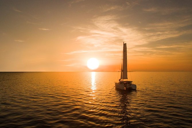 Santorini Luxury Catamaran Sunset Cruise with BBQ, Drink and Transfer - Comfort, crew, and the social mood