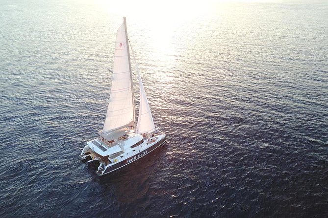 Santorini Luxury Catamaran Sunset Cruise with BBQ, Drink and Transfer - Sailing beside the volcano and Palea Kameni
