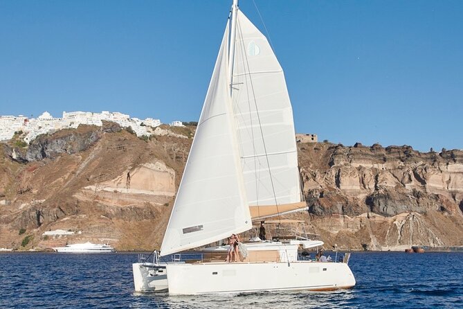 Santorini Platinum Catamaran Cruise with Meal, BBQ and Open Bar - Why seeing Santorini from the sea matters