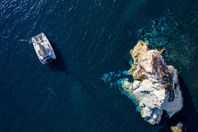 Santorini Platinum Catamaran Cruise with Meal, BBQ and Open Bar - Leaving Vlichada and finding the boat