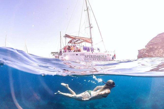 Santorini Private Catamaran Cruise with BBQ, Open Bar & Transfers - Why Santorini is better from the water