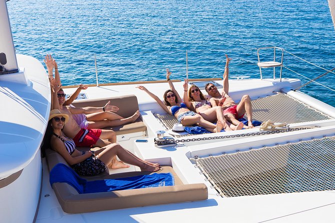 Santorini Private Catamaran Cruise with BBQ, Open Bar & Transfers - White Beach and Mesa Pigadia for swimming