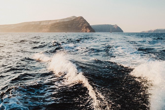 Santorini Private Catamaran Cruise with BBQ, Open Bar & Transfers - Indian Rocks and the caldera cliffs