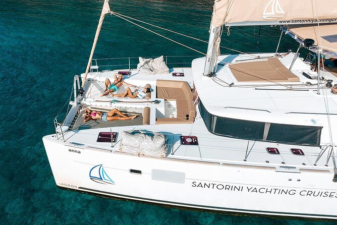 Santorini Sunset Sailing Cruise: Dinner, BBQ, Open Bar, Transfers - Leaving from Vlychada Port