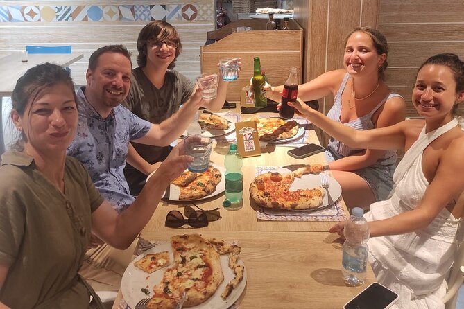 Semi-Private Pizza Making Experience in Naples with Drink - Why the eight-person limit matters