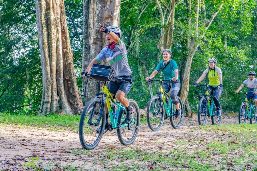 Siem Reap: Angkor Sunset Bike & Boat Tour /E-Bike Available - Angkor after the main crowds begin to leave