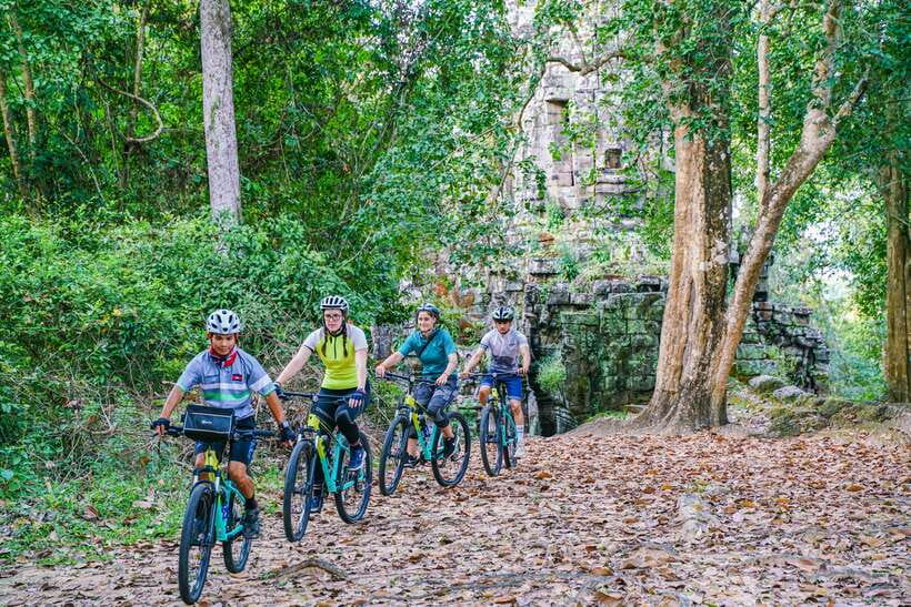 Siem Reap: Angkor Sunset Bike & Boat Tour /E-Bike Available - Guides, pace, and practical comfort