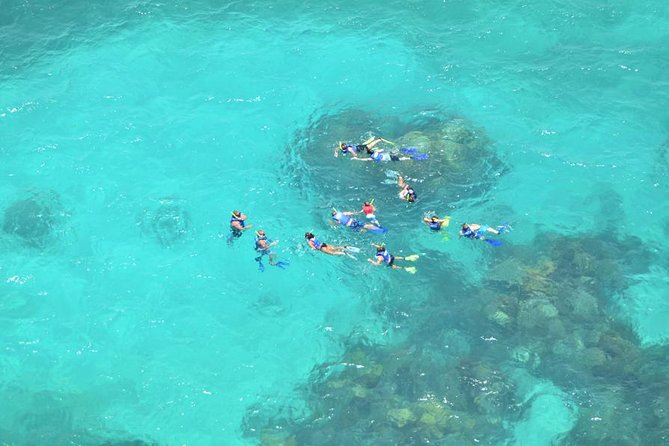 Snorkeling Adventure at Isla Mujeres Includes Lunch and Open Bar - Lunch and beach club time