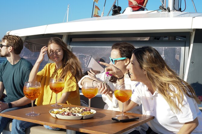 Sunset Catamaran: Small Group, Drinks, Snacks & Dinner Upgrade - Barcelona from the water at sunset