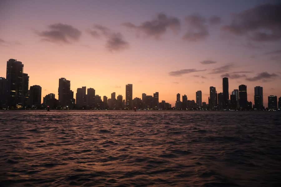 Sunset Party open bar on the bay while sharing with locals - Watching the sunset from the water
