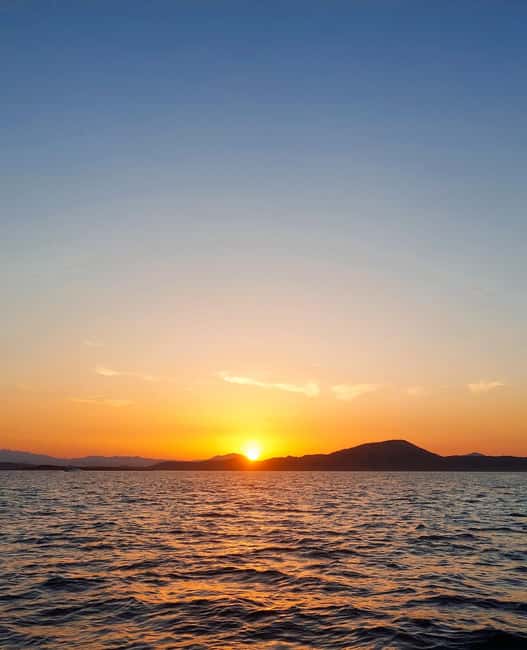 Tavolara: Sunset Aperitif Tour with Drinks and local snacks - Leaving Porto San Paolo for Tavolara