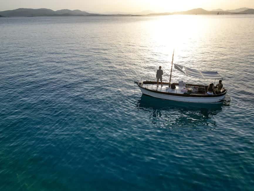 Tavolara: Sunset Aperitif Tour with Drinks and local snacks - Swimming and snorkeling at Molara