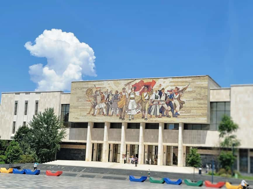 Tirana by Night: Walking Tour with Cocktail & City Lights - Skanderbeg Square and the heart of Tirana