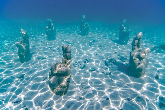 Top Isla Mujeres Catamaran Tour with Snorkel Open Bar and Buffet lunch - The return sail and sunset views