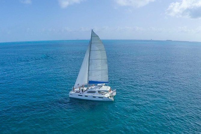 Top Sailing to Isla Mujeres with lunch and open bar from Cancun - Sailing from Marina Albatros into open Caribbean water
