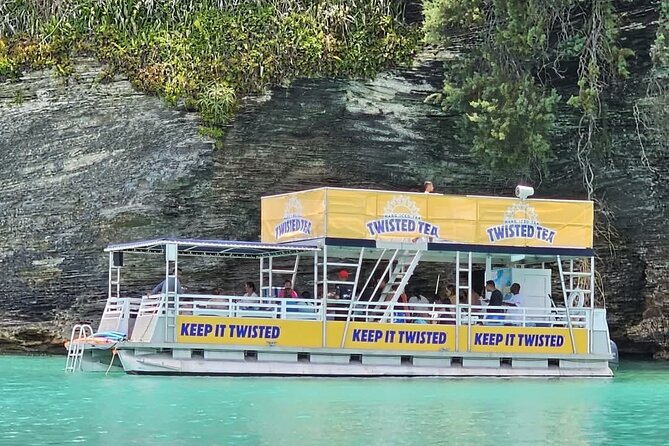 Twisted Tea Pontoon Party Boat in beautiful Bermuda - Daniel’s Head pairs pink sand with the Vixen wreck