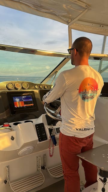 Valencia: Exclusive Sunset Cruise with Drink - Leaving Malvarrosa Beach for the water